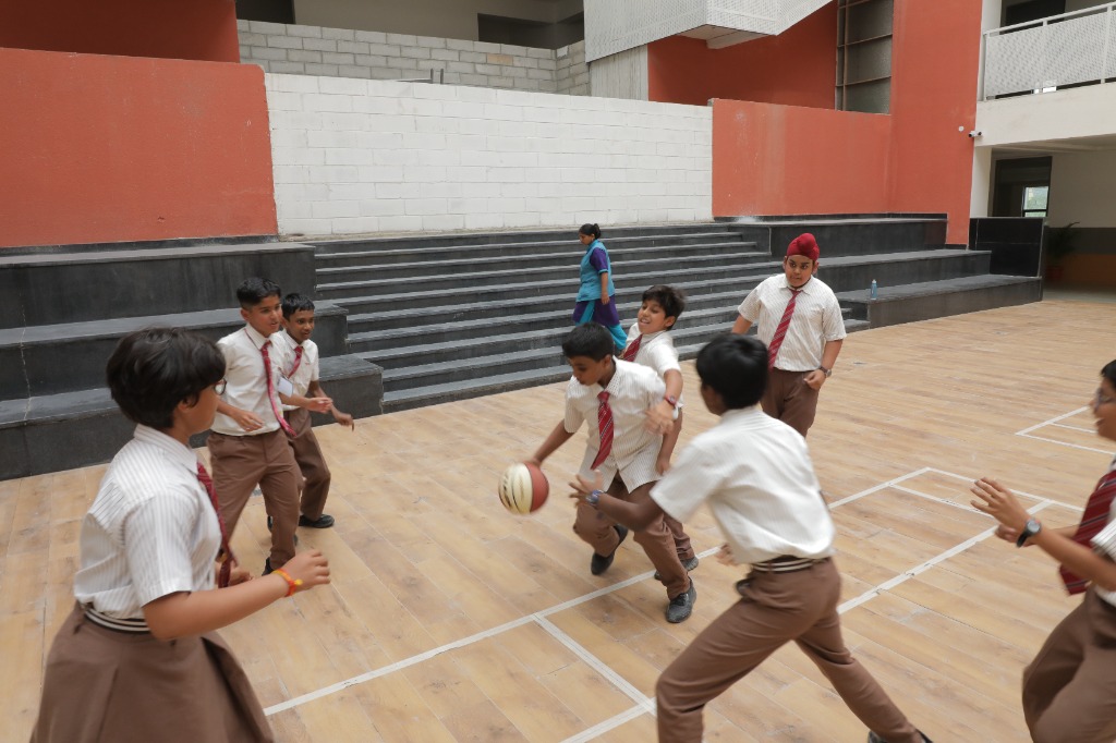Indoor Basketball Action Match at NPS Hopefarm